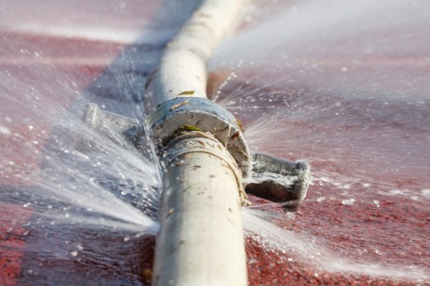 Burst water pipe, leaking water