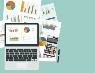 Data graphs on a laptop and reports