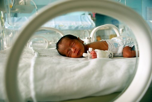 new-born baby in incubator