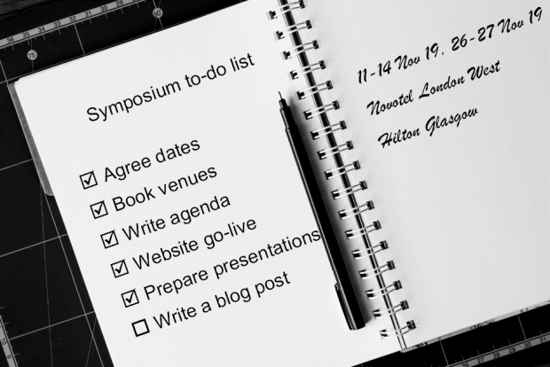 Notebook with a to do list:  Agree dates and book venues:  11 to 14 Nov 1029 at the Novotel London West and 26 26 to 27 November at the Hilton Glagow.  Write agenda, website go-live, prepare presentation and write a blog post 